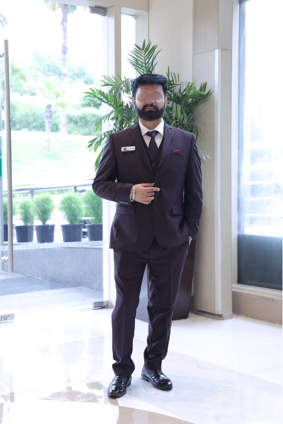 M. Arora after the styling session — tailored three-piece suit