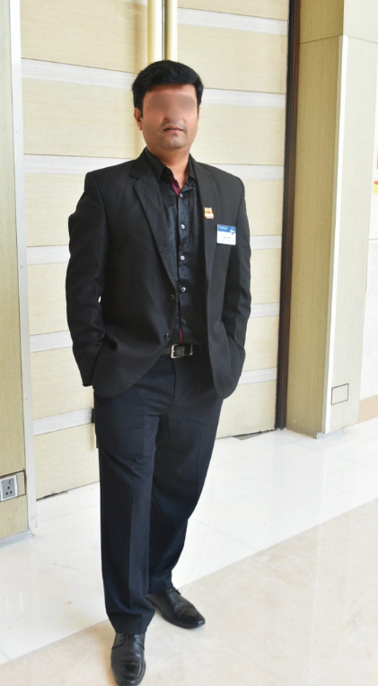 M. Arora before the styling session — black suit